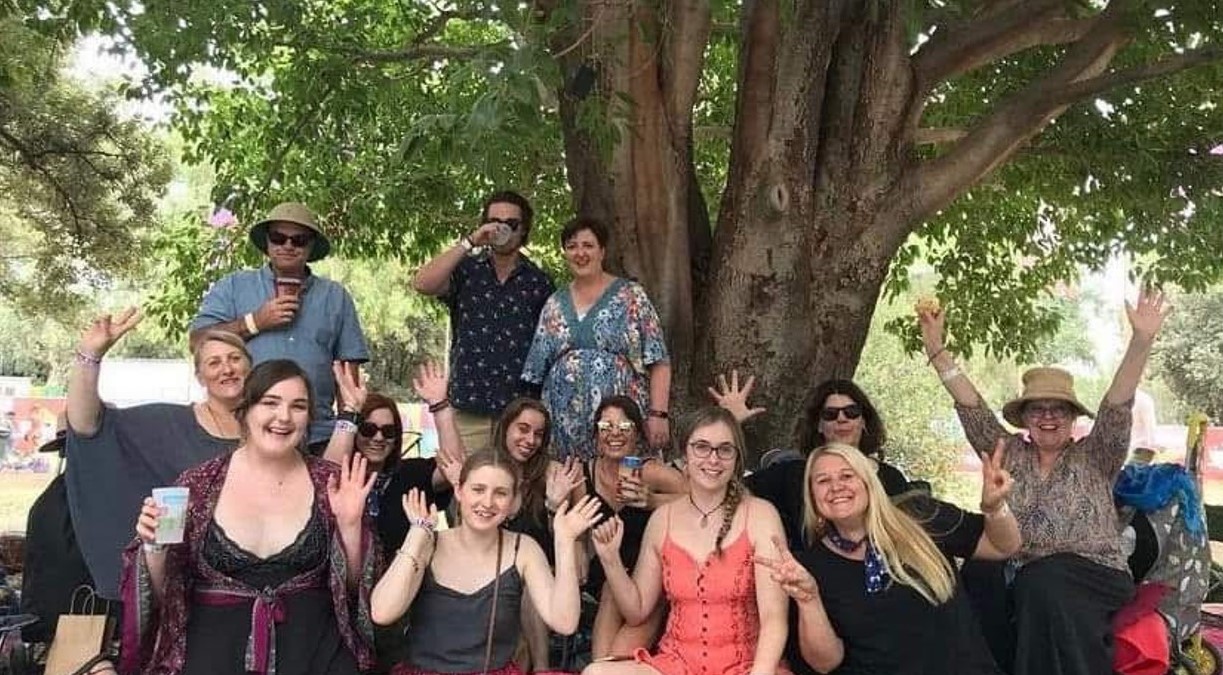 Womad family under the tree